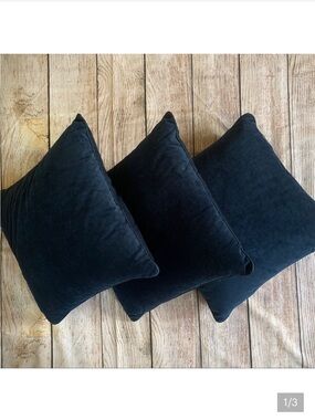 Set of three navy velour pillows
